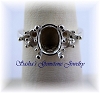 9 X 7 OVAL STERLING SILVER RING SETTING W/(6) 3 RD ACCENTS